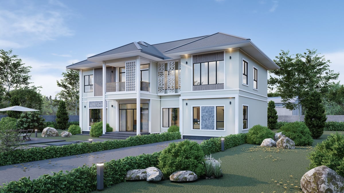 Modern two-story house with lush garden and driveway — MAY Engineering residential engineering Ontario