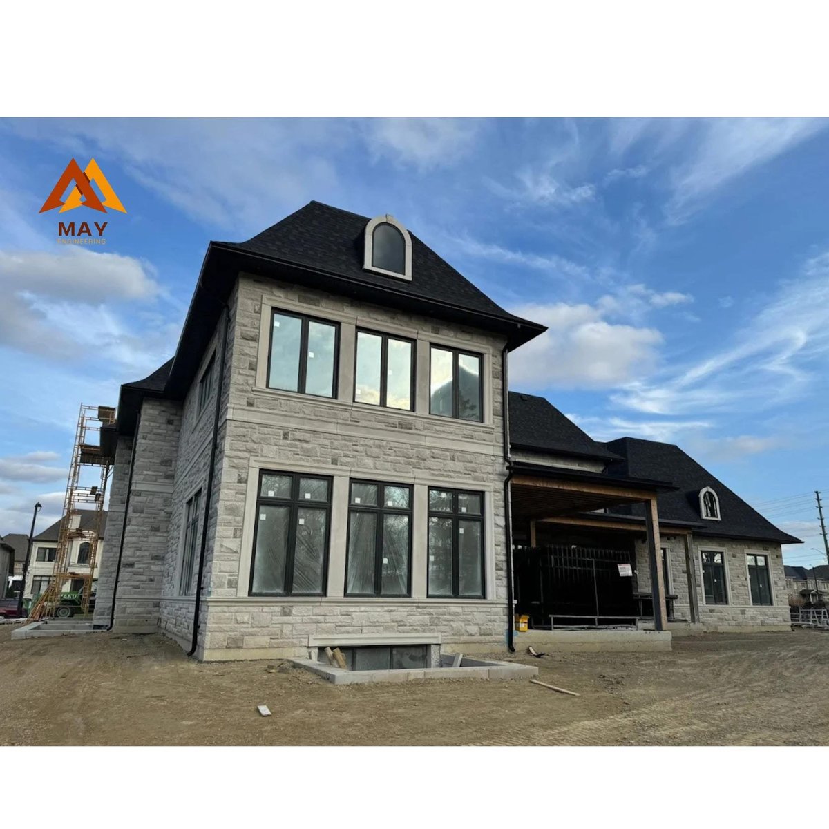MAY Engineering Inc. engineering team Ontario — Modern Stone Home — Front Elevation